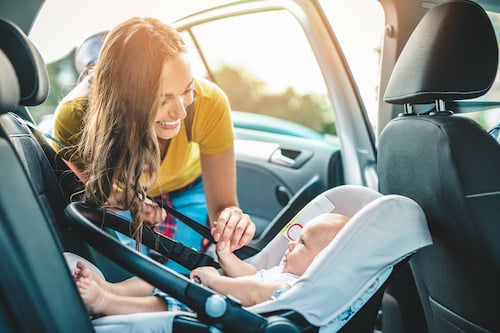baby in car nseat with mom