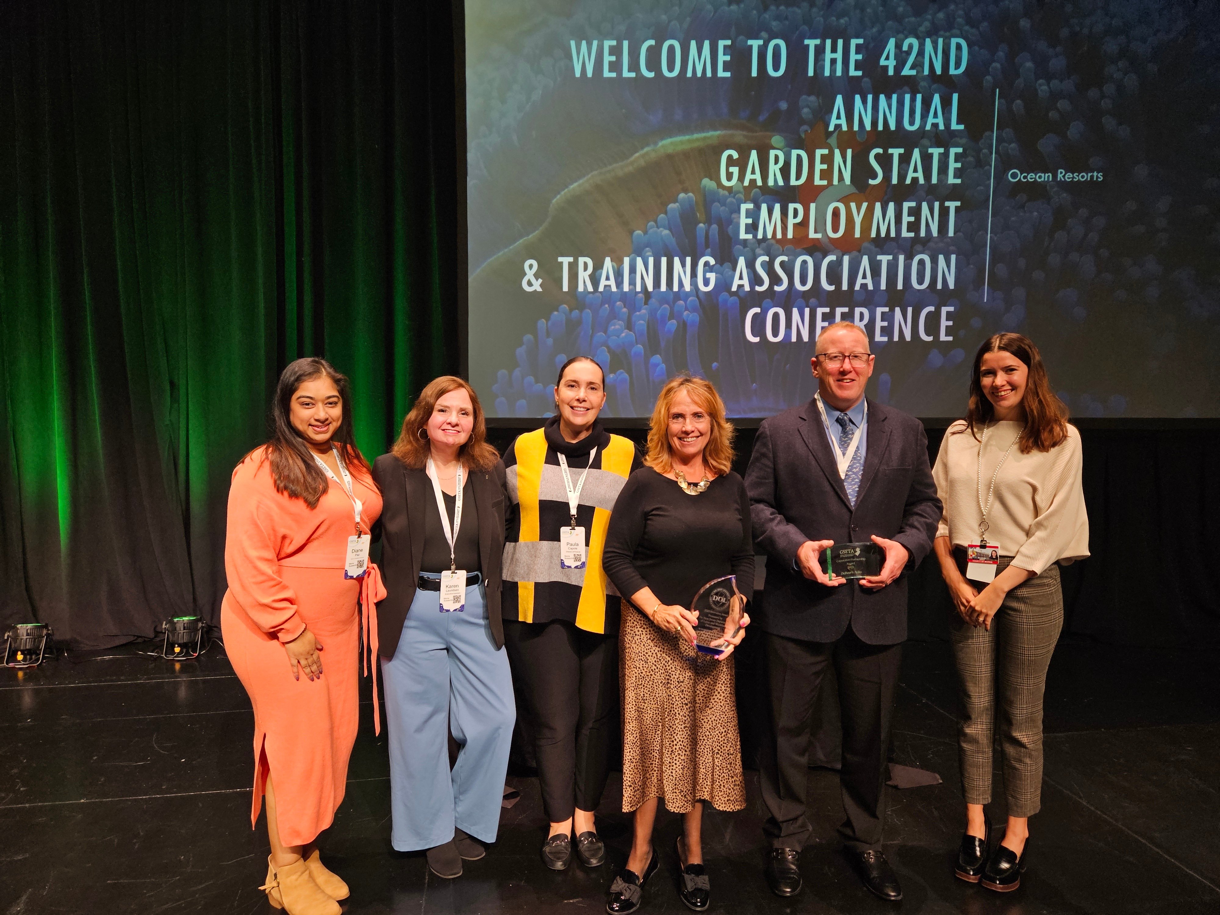 Bill DeBoer receiving award at GSETA conference