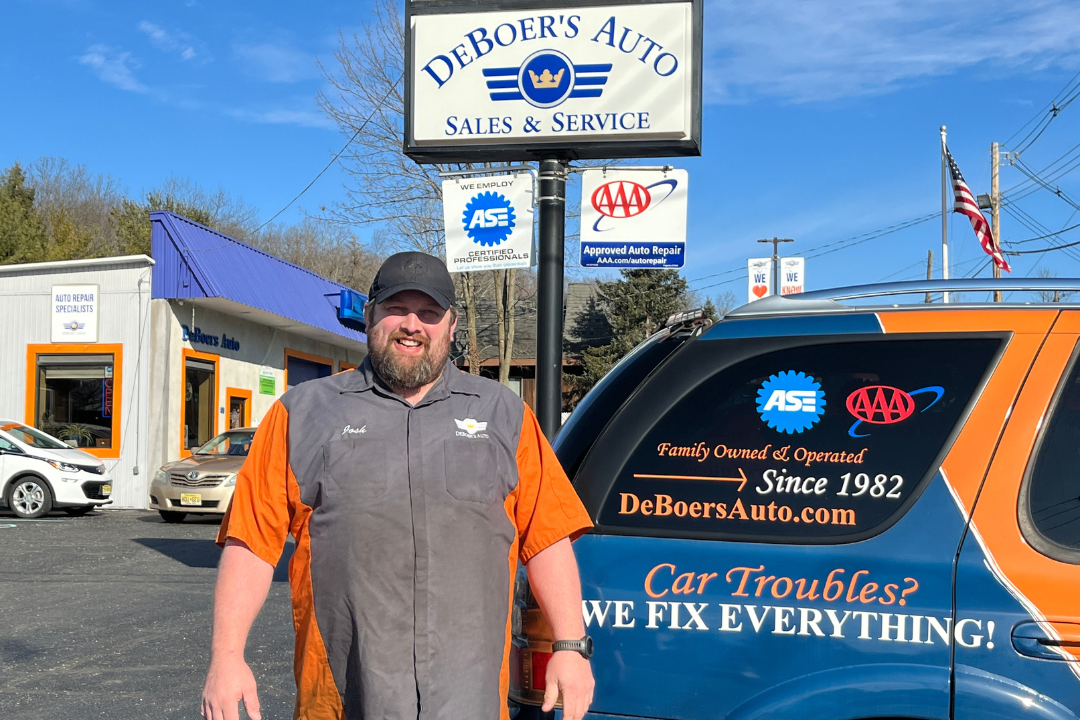 josh in front of shop