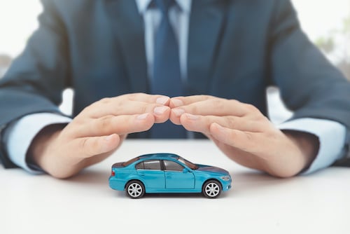 Protective Hands covering car