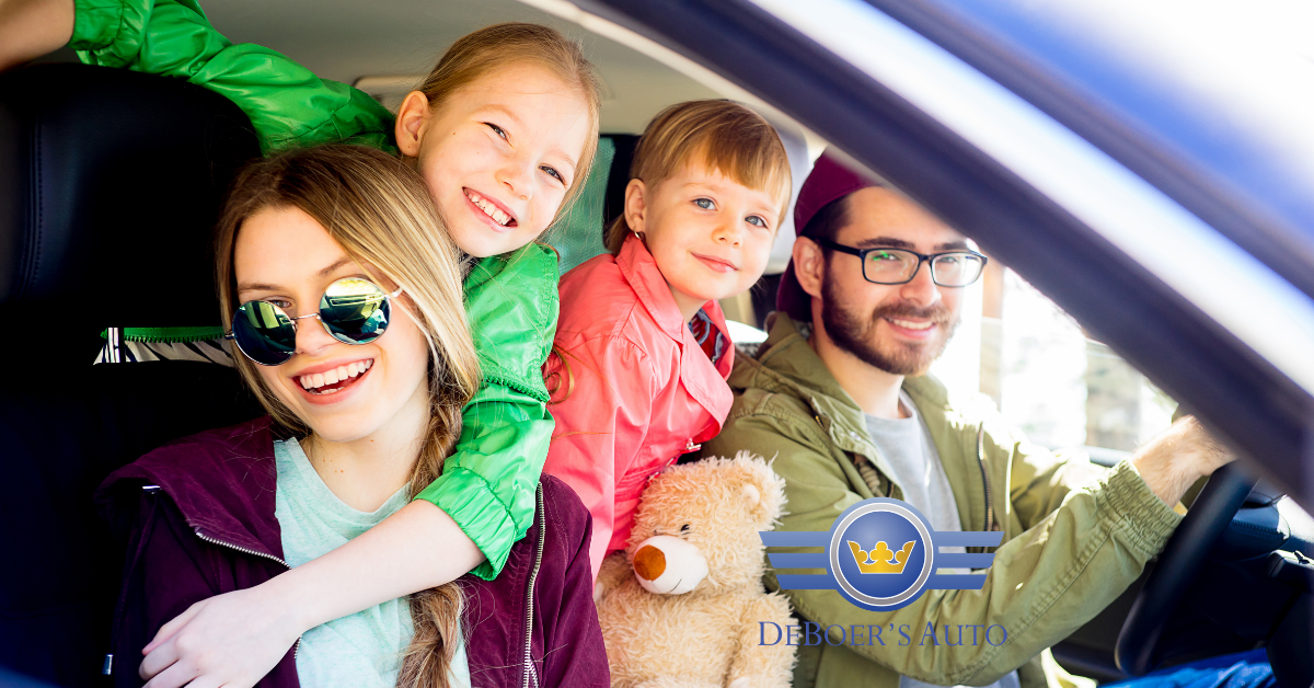 family in car